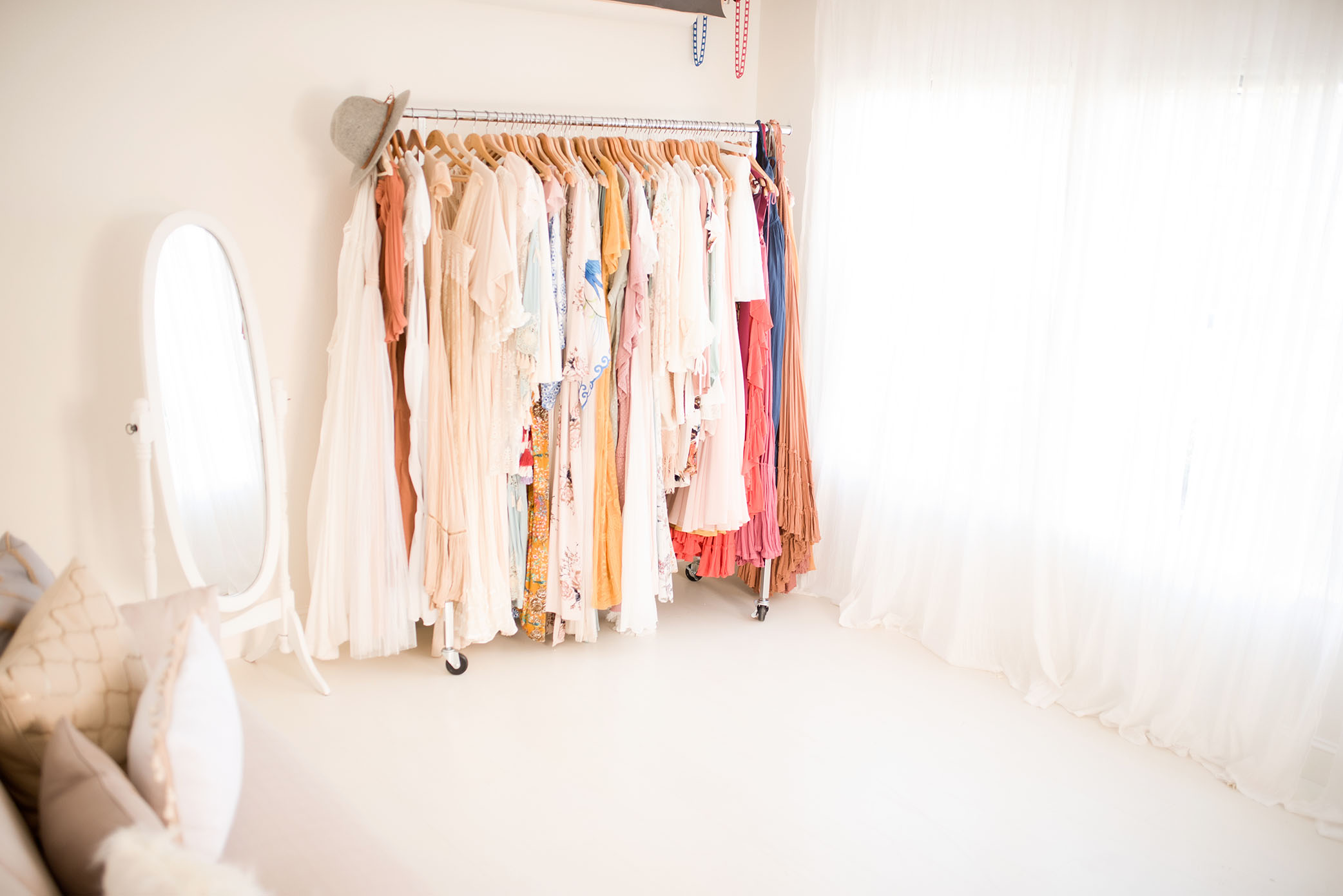 A wardrobe sits in a bright room, captured by Sweet Beginnings Photography by Stephanie, a Sacramento Newborn and Family Photographer