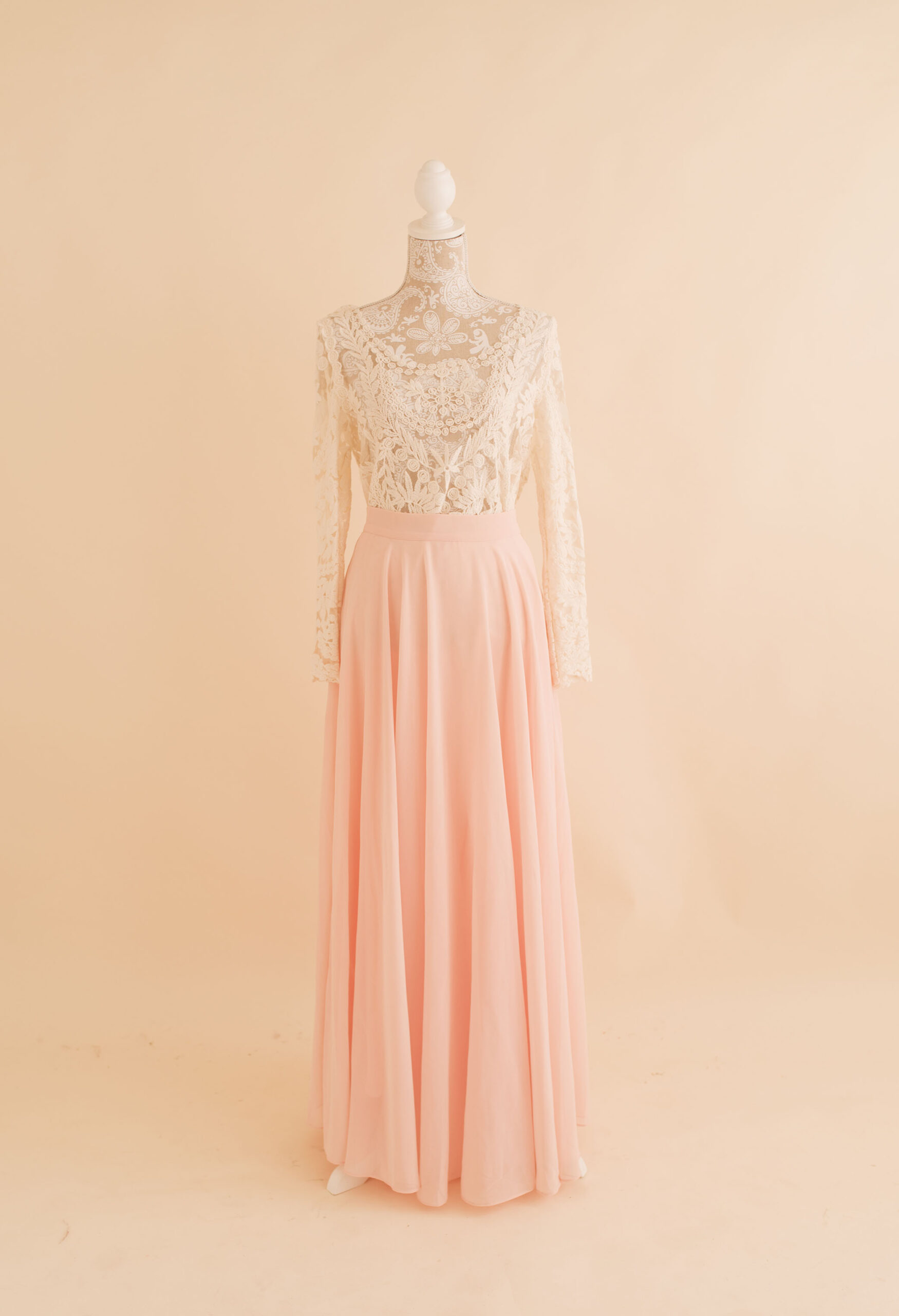 white lace top and pink maxi skirt available in studio wardrobe 