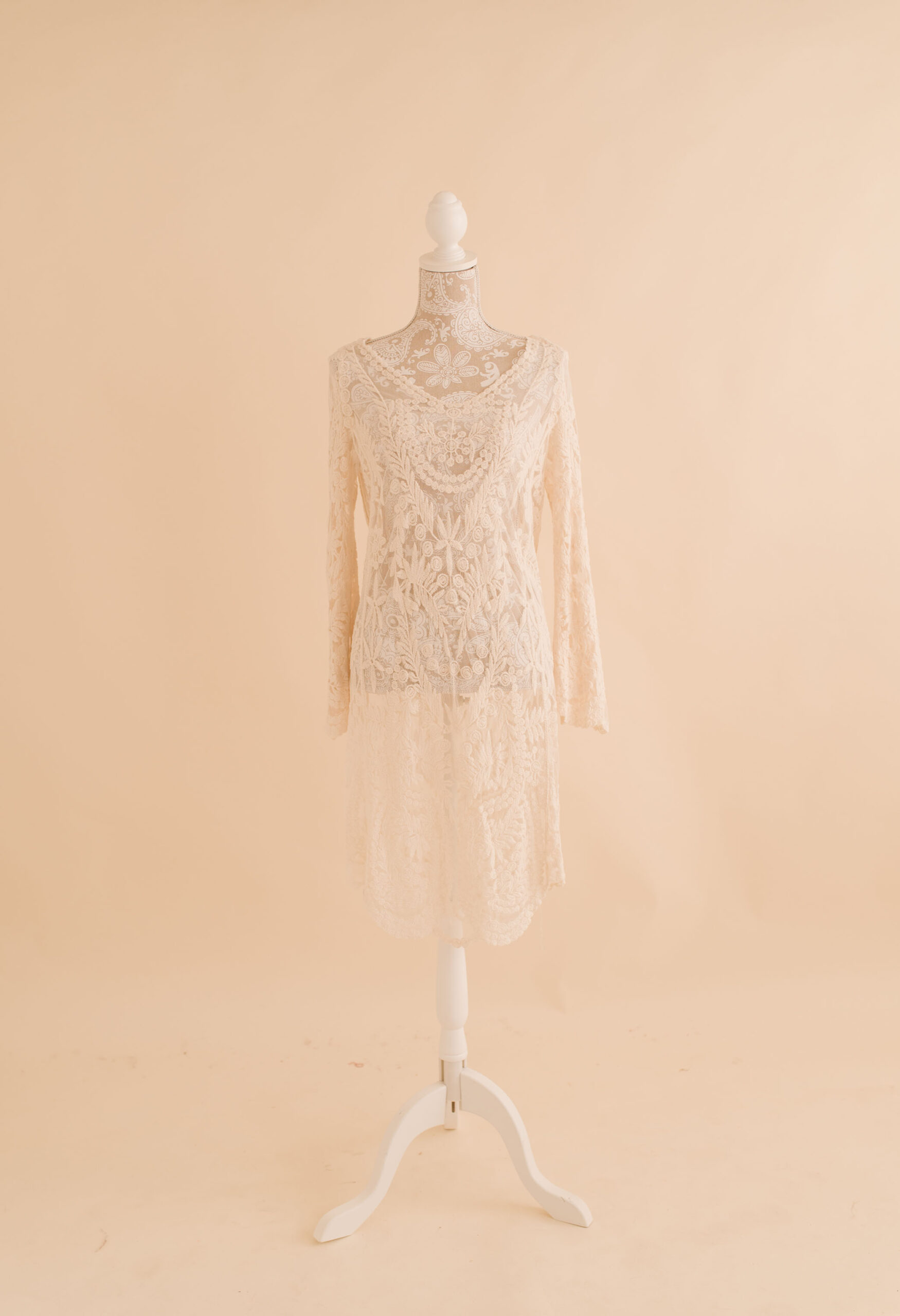 white lace dress available in studio wardrobe 