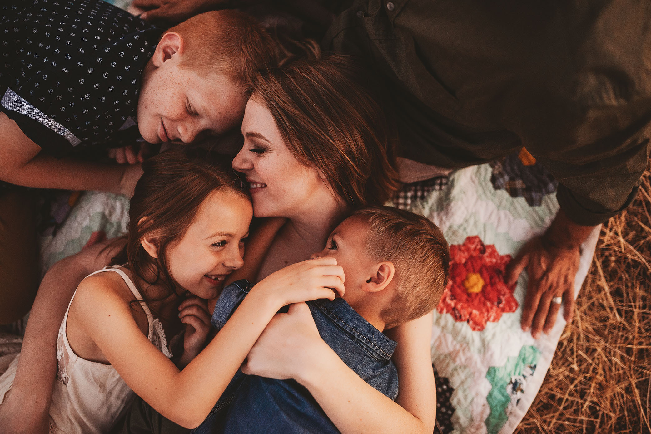 Children pile on top of their mother | Sweet Beginnings Photography by Stephanie | Sacramento Area Family Photographer