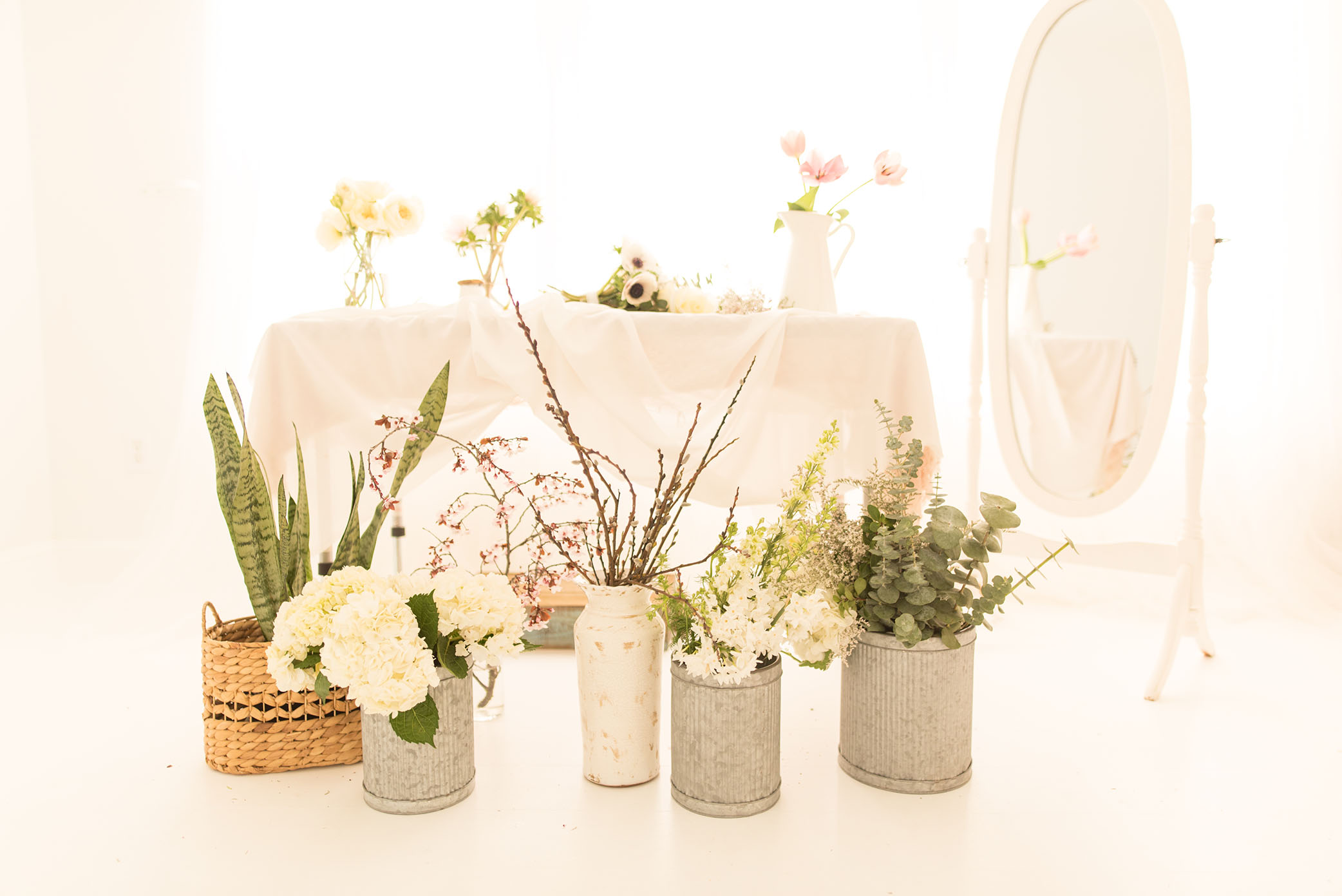 Flowers are arranged in vases. 