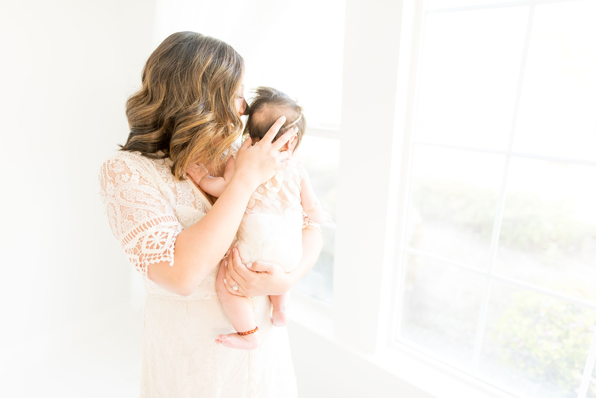 Love in the studio in honor of Mothers Day captured by Sweet Beginnings Photography by Stephanie
