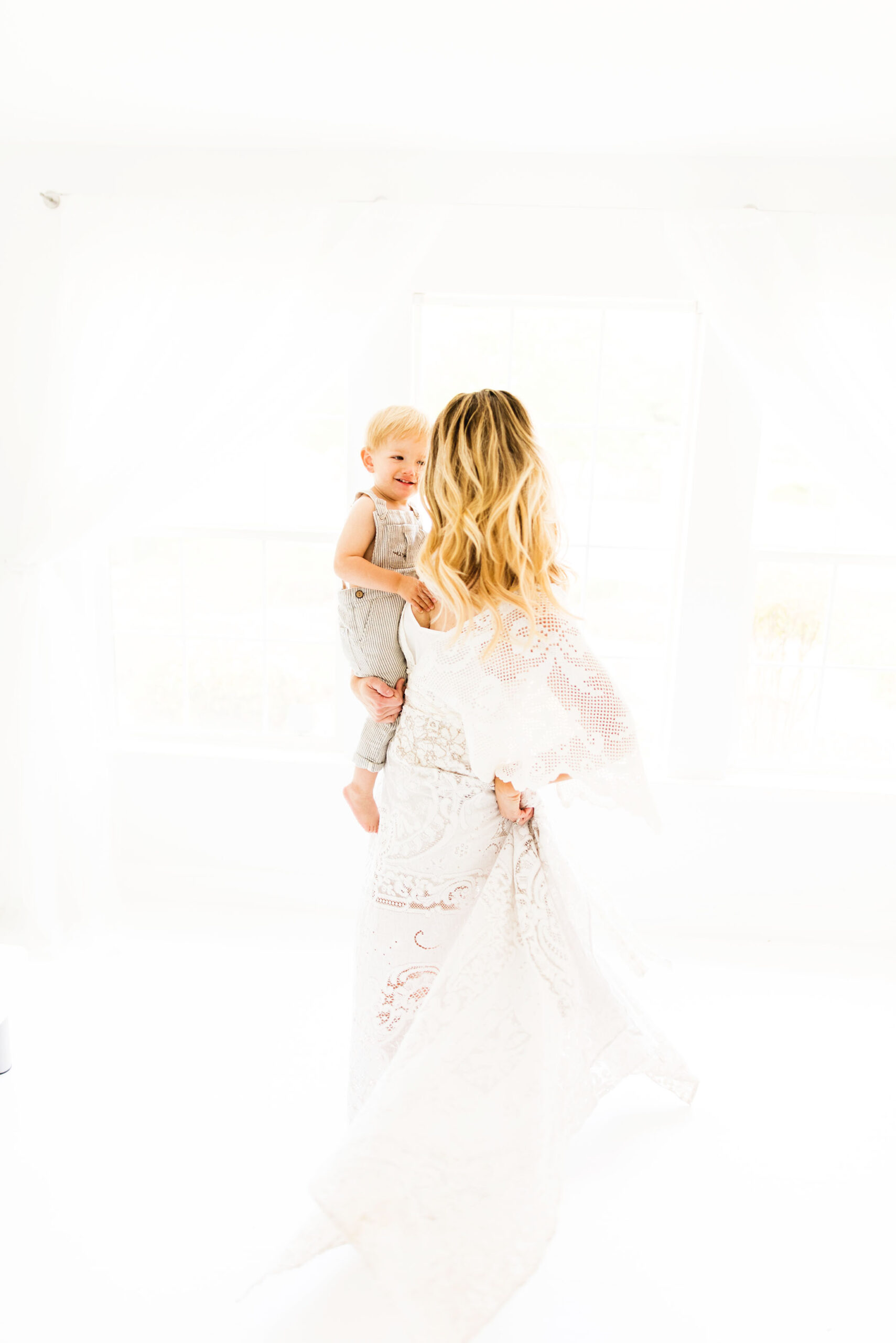 Mom dances with son at the studio captured by Sweet Beginnings Photography by Stephanie