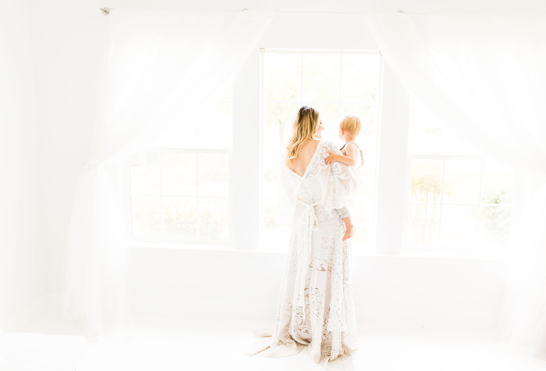 Studio full of light and white captured by Sweet Beginnings Photography by Stephanie