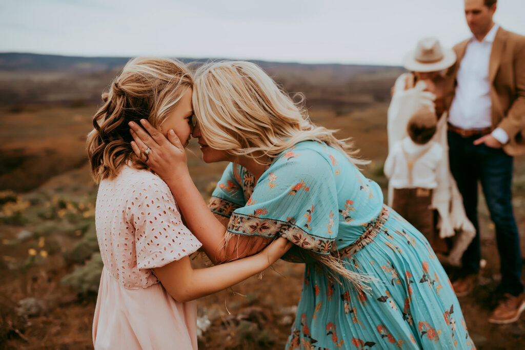 Mom looks at daughter nose to nose 